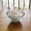 A bowl of on a table, labeled 'Ragi Milk Powder-Ragi PAAL