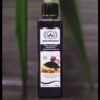 Bottle of Rveeorganics Karimjeerakam Onion Hair Oil with natural ingredients displayed